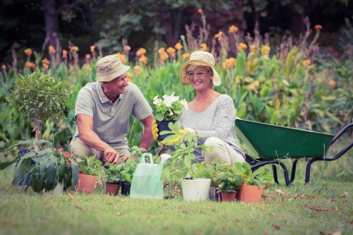 Gardener working on a small Willesden front garden