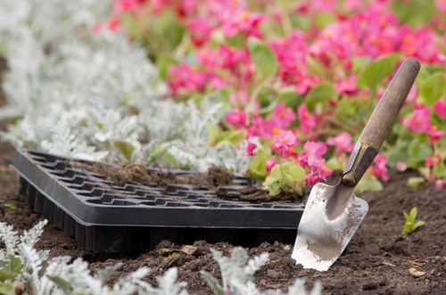 Inspector reviewing gardening job records and photos